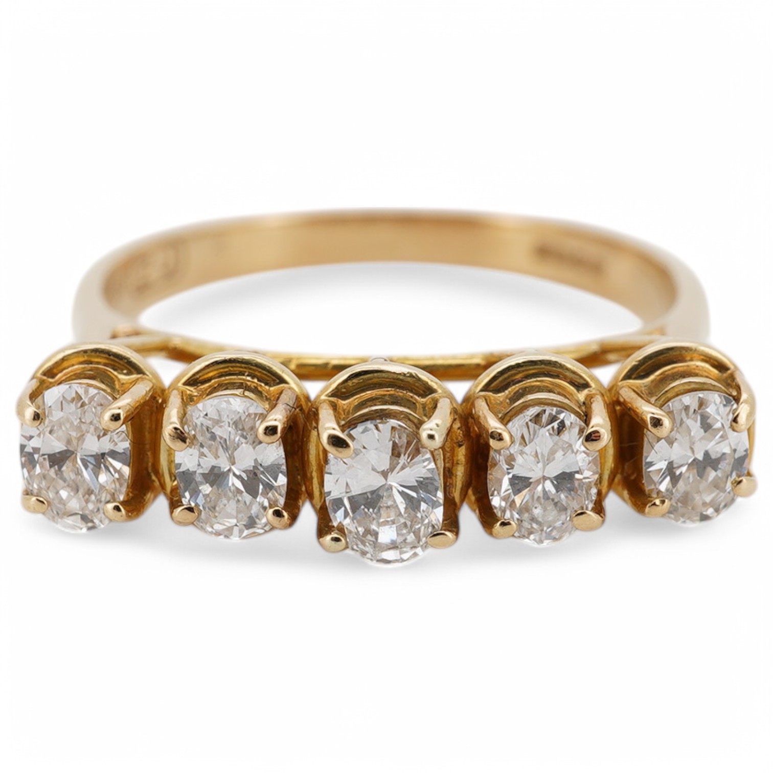 A modern 18ct gold and five stone oval cut diamond set half hoop ring, size N, gross weight 3.8 grams. Condition - fair to good